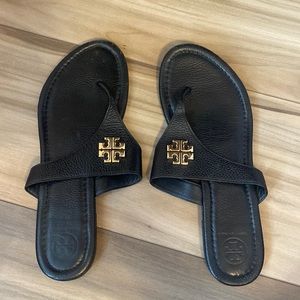 Black Tory Burch sandals.